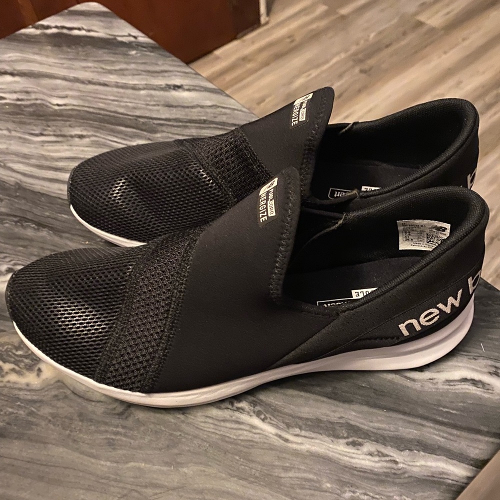 New Balance, black slip-on sneaker (women’s)